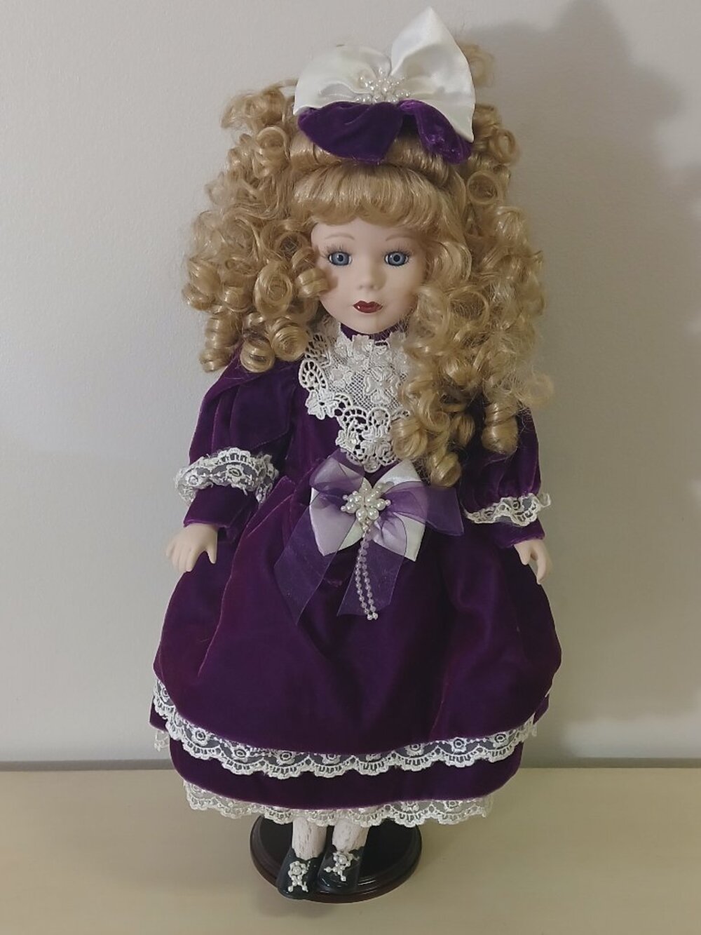 Vintage victorian porcelain doll with stand